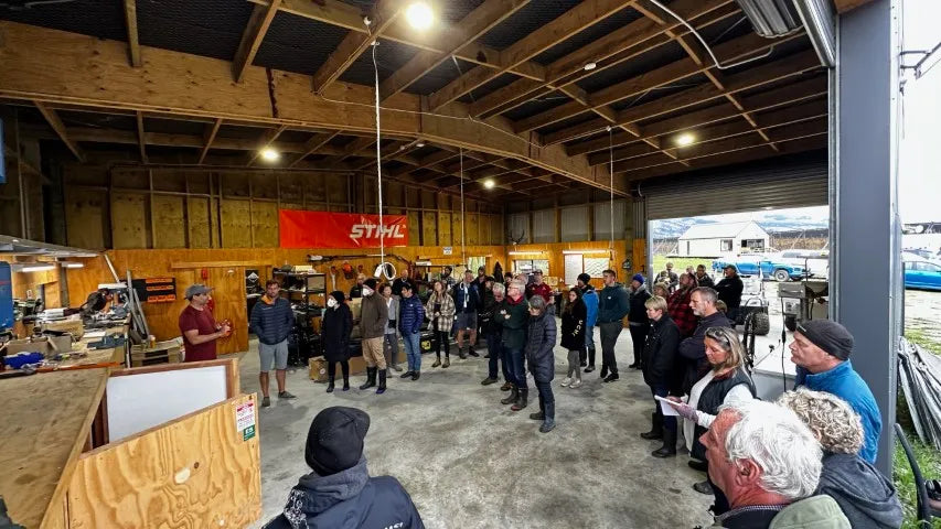 Tour group inside the shed